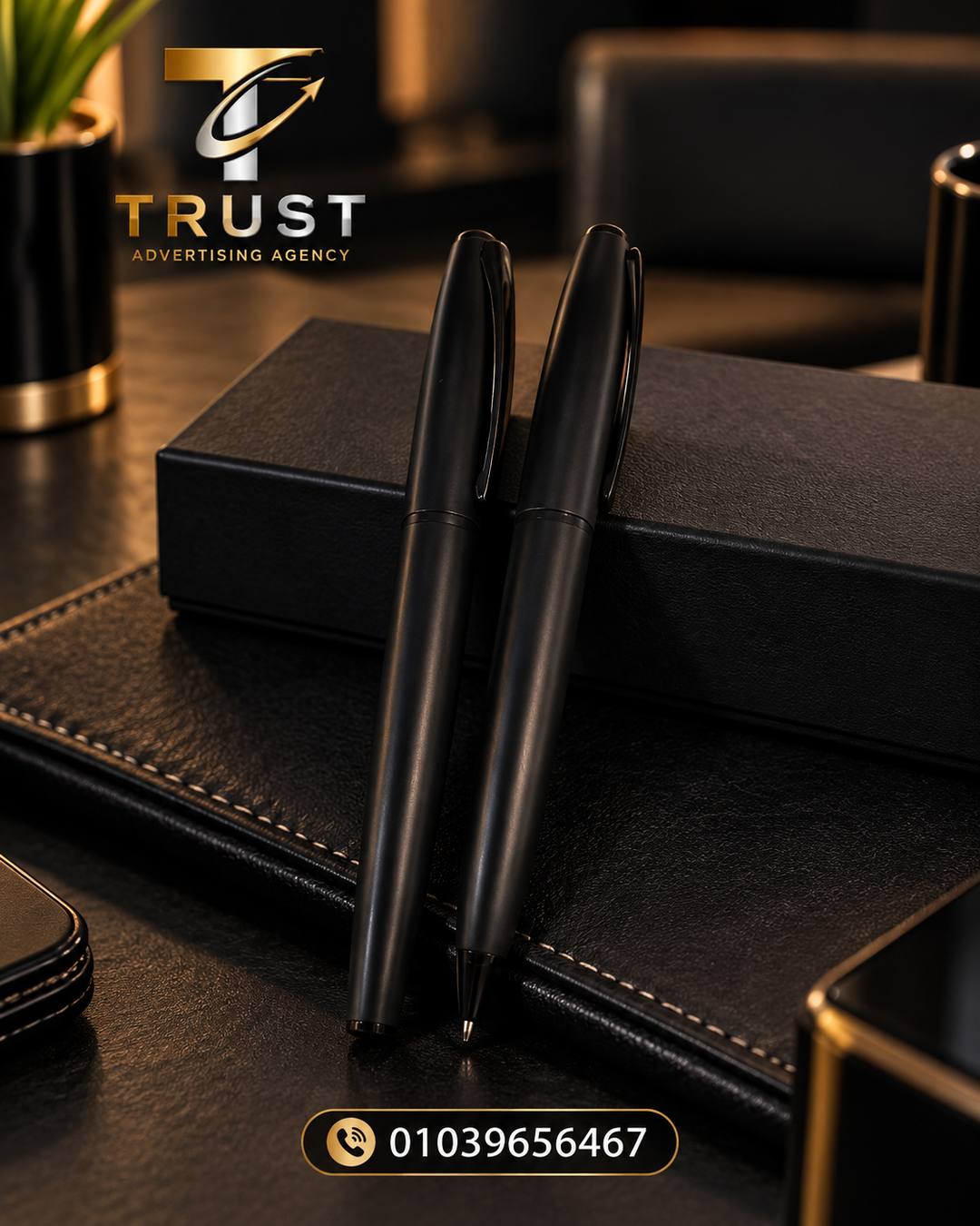 TRUST_two_black_pens_compressed قلم هدية للشركات | قلم دعائي بطباعة لوجو - الصورة 1
